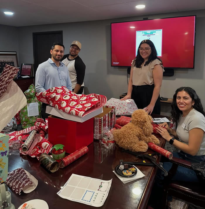 Barristers wrapping gifts for 2025 elves program