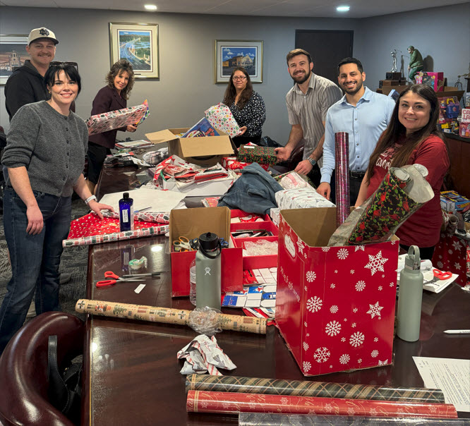 Barristers wrapping gifts for 2025 elves program